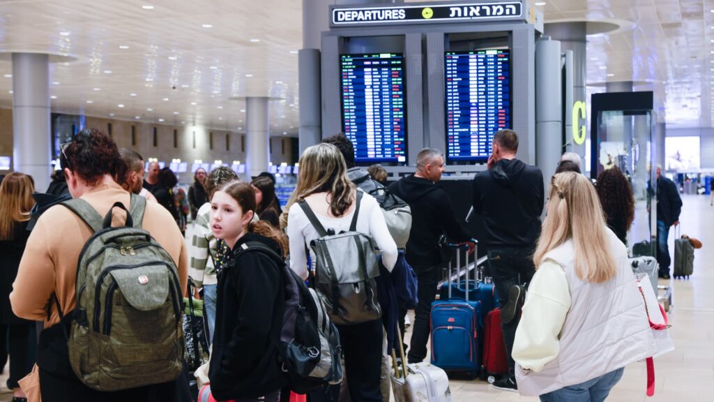 A missile from Yemen halts flights in Israel hours before top officials vote on plans for Gaza war